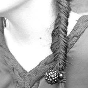 Disco ball hair tie and two binders with beads.